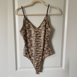 Brand new snake body suit